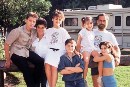 Arlyn Phoenix with her former husband and five children.